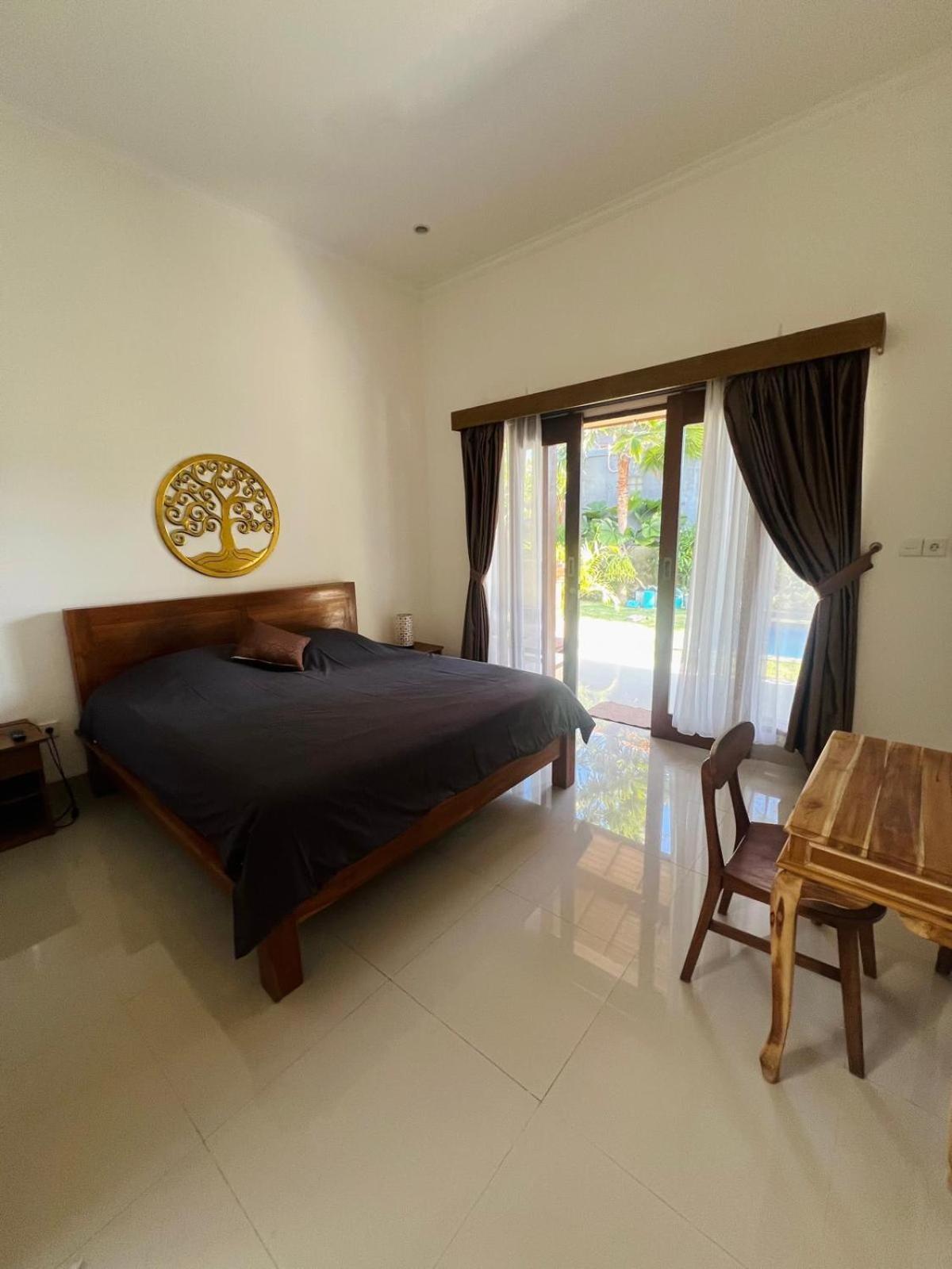 Wiryaroja Guest House Canggu  Bagian luar foto